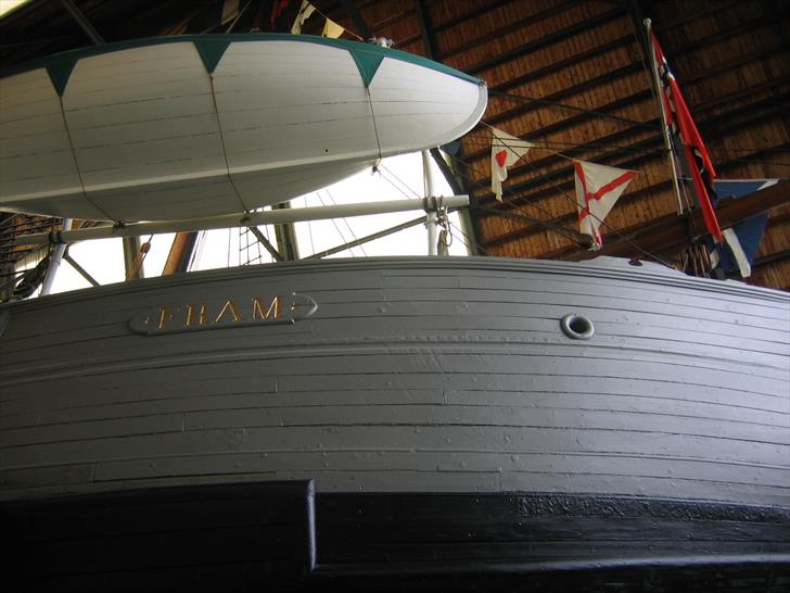The Fram's name plate and lifeboat
