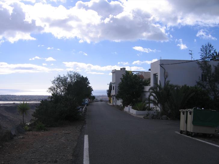 Montaña la Data houses and road on the cliff Montaña la Data houses and road on the cliff