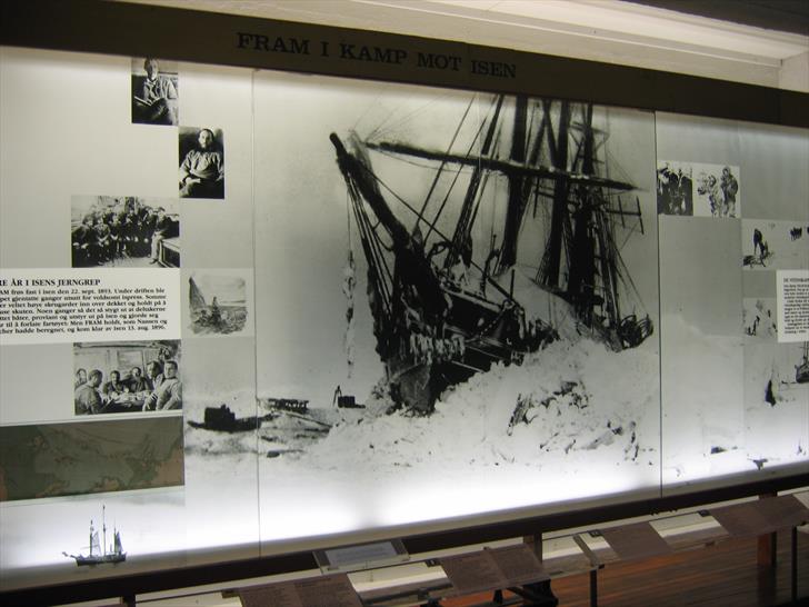 This exposition shows a photo of 'the Fram fighting against the ice.' Fram Museum exposition